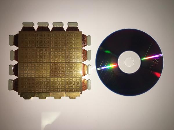 A Cray 3 Module compared to a standard DVD